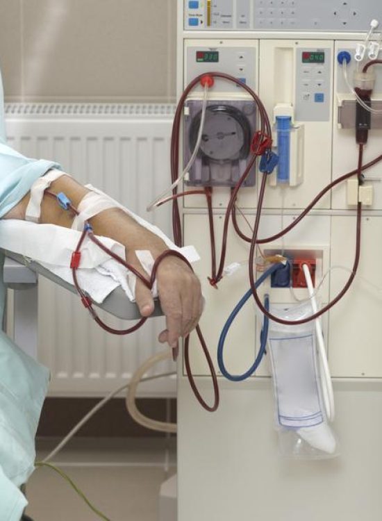 patient helped during dialysis session in hospital