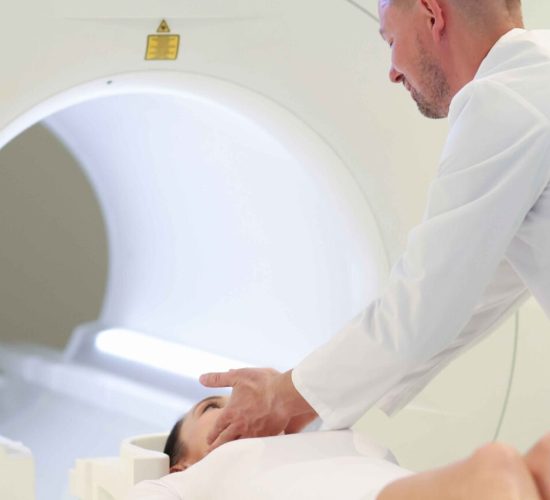 doctor-helping-woman-lie-down-mri-machine-clinic-correct-positioning-patient-during
